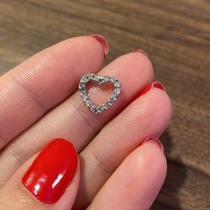 Sterling silver heart and diamond pendant.
